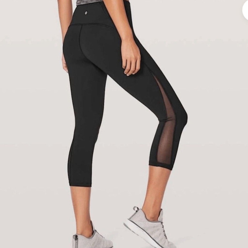 Black train times mesh leggings